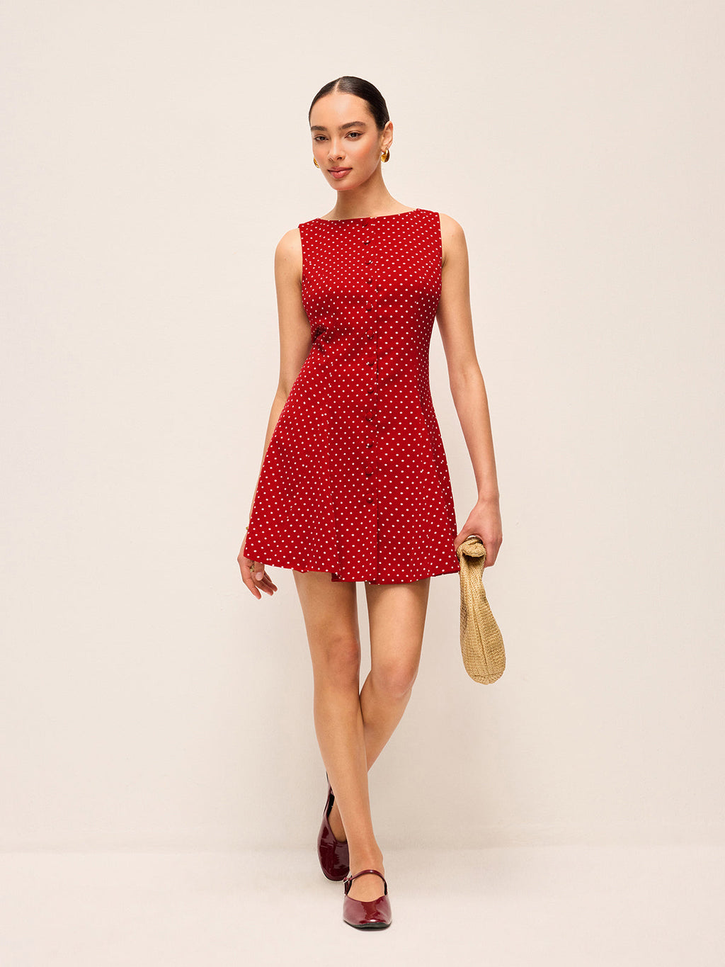 Robe sans manches à pois avec lien au dos