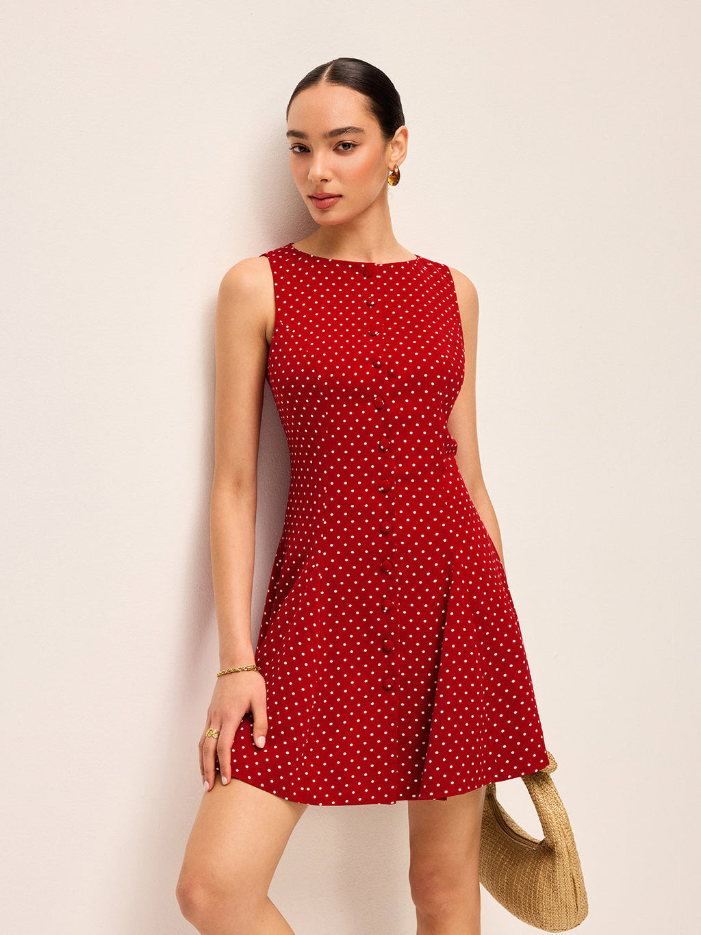 Robe sans manches à pois avec lien au dos