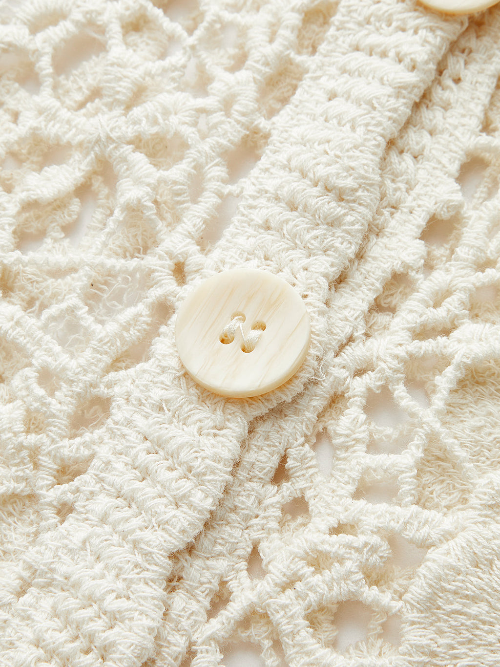 Cardigan boutonné en dentelle au crochet