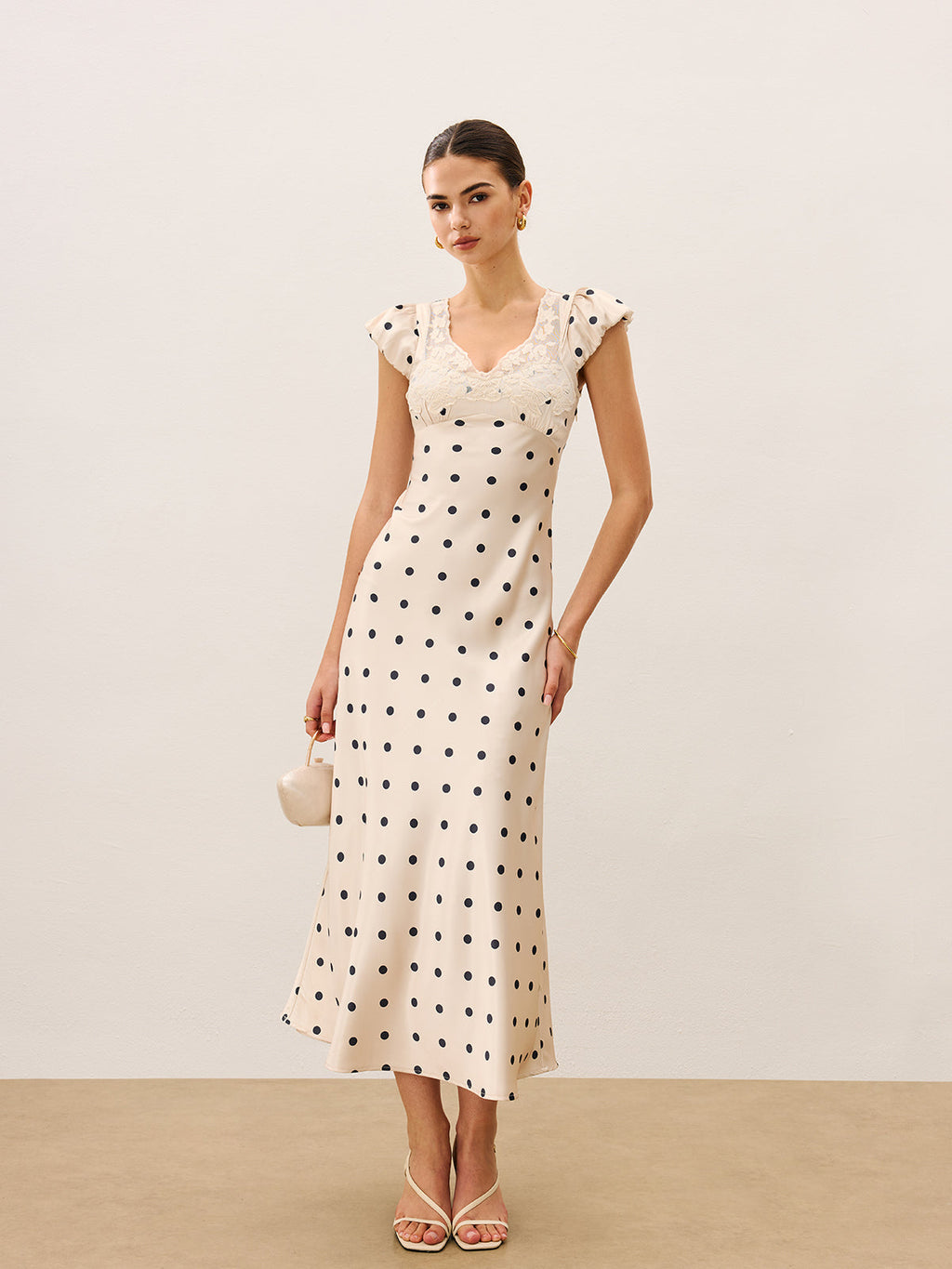 Kleid mit Spitze und Polka Dots