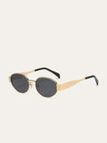 Lunettes de soleil ovales à monture dorée