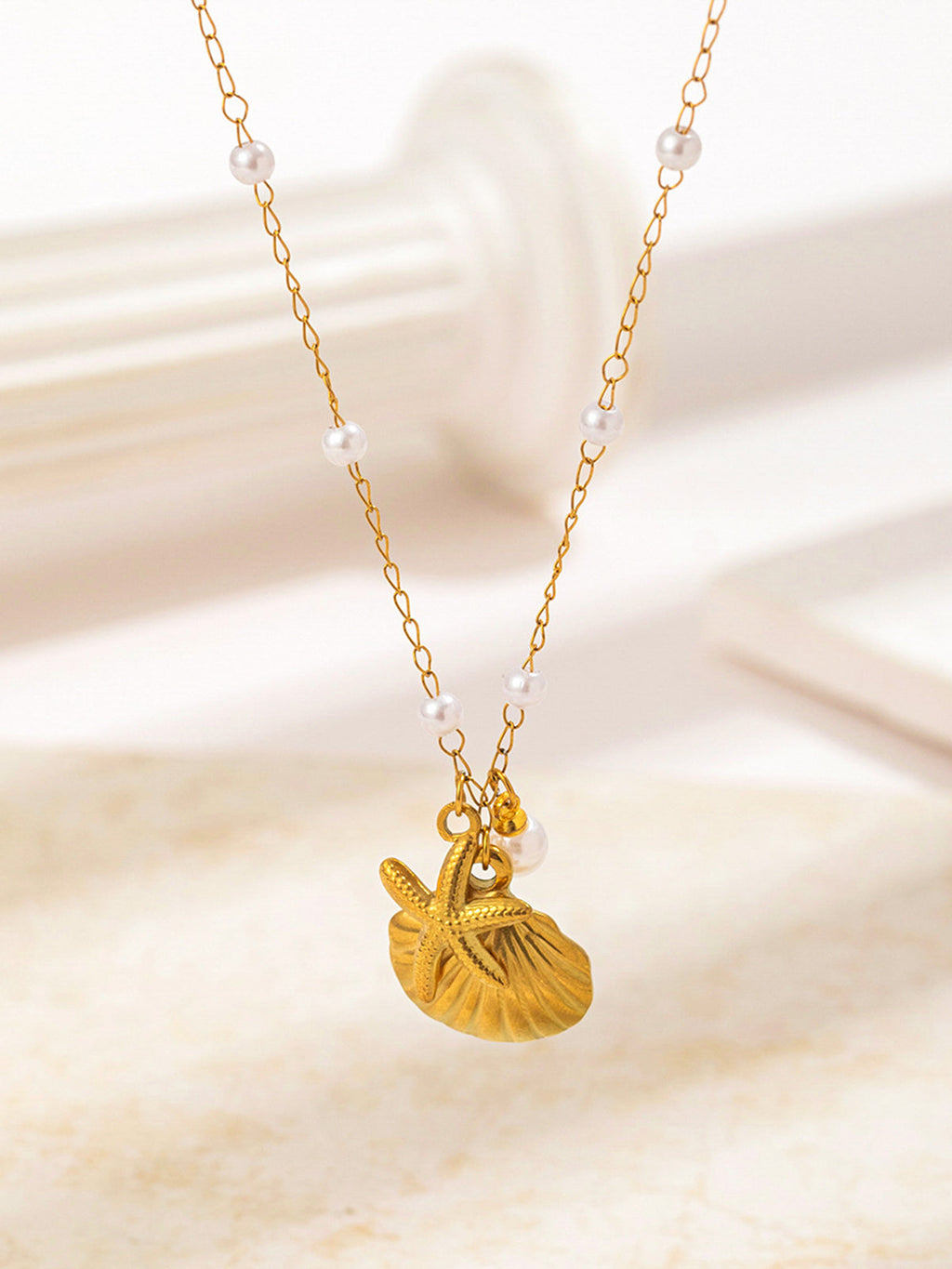 Collier Coquillage Doré et Étoile de Mer Avec Perles