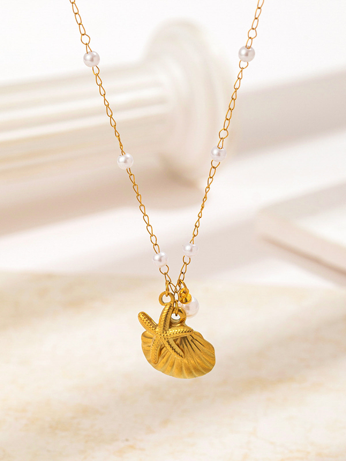 Collier Coquillage Doré et Étoile de Mer Avec Perles