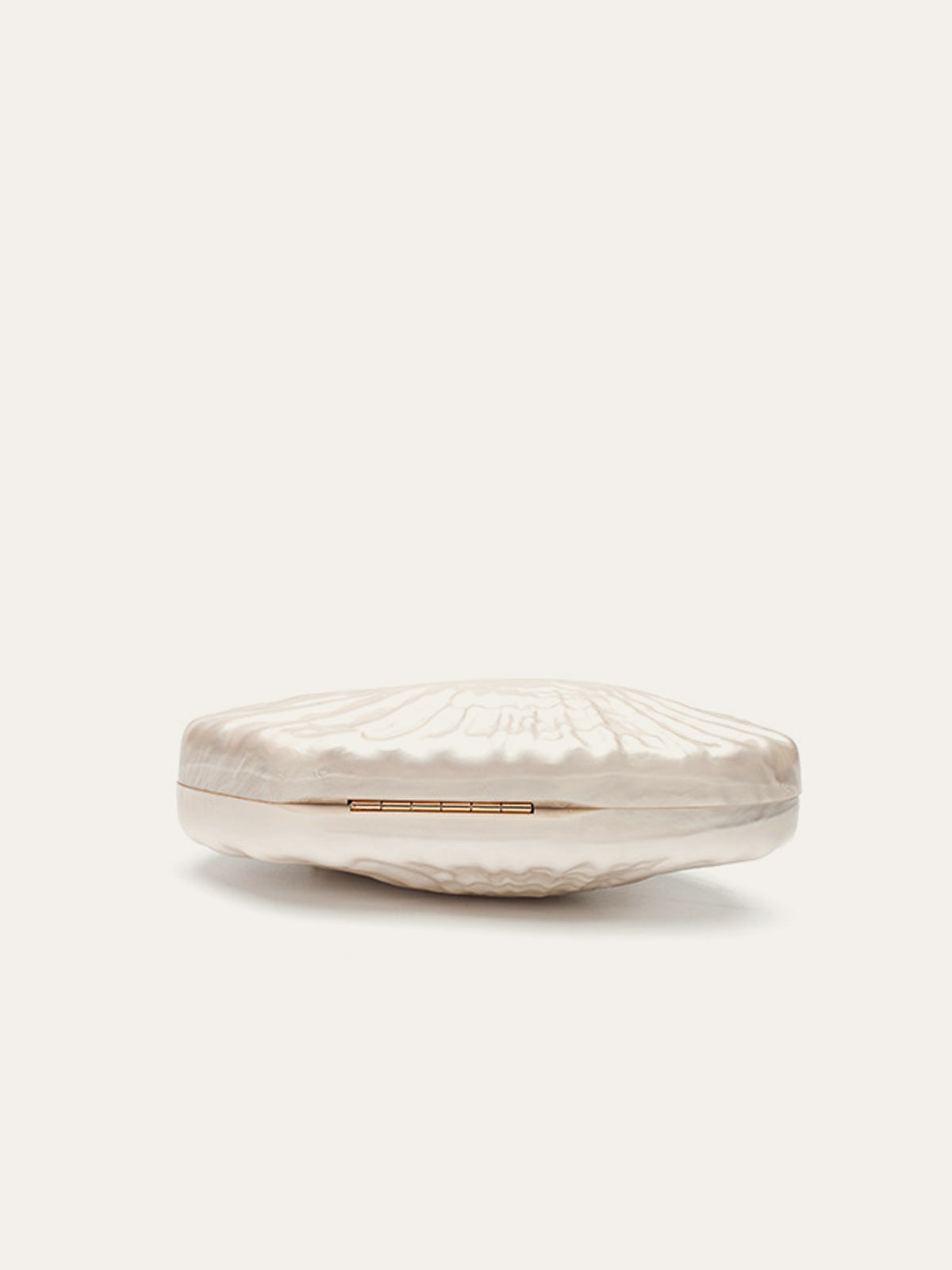 Pochette à effet perle avec chaîne dorée 