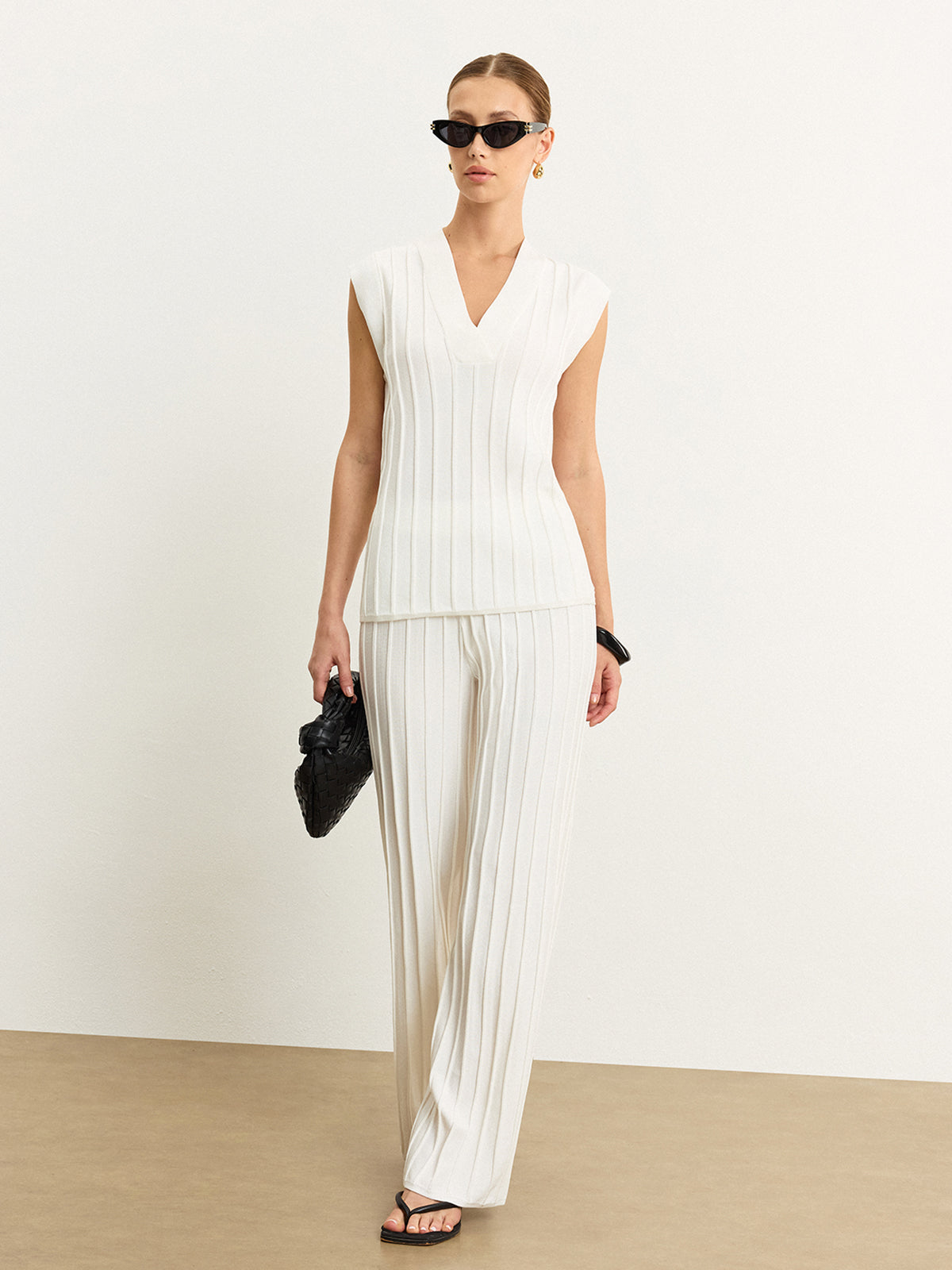 Pantalon taille mi-haute en maille côtelée 