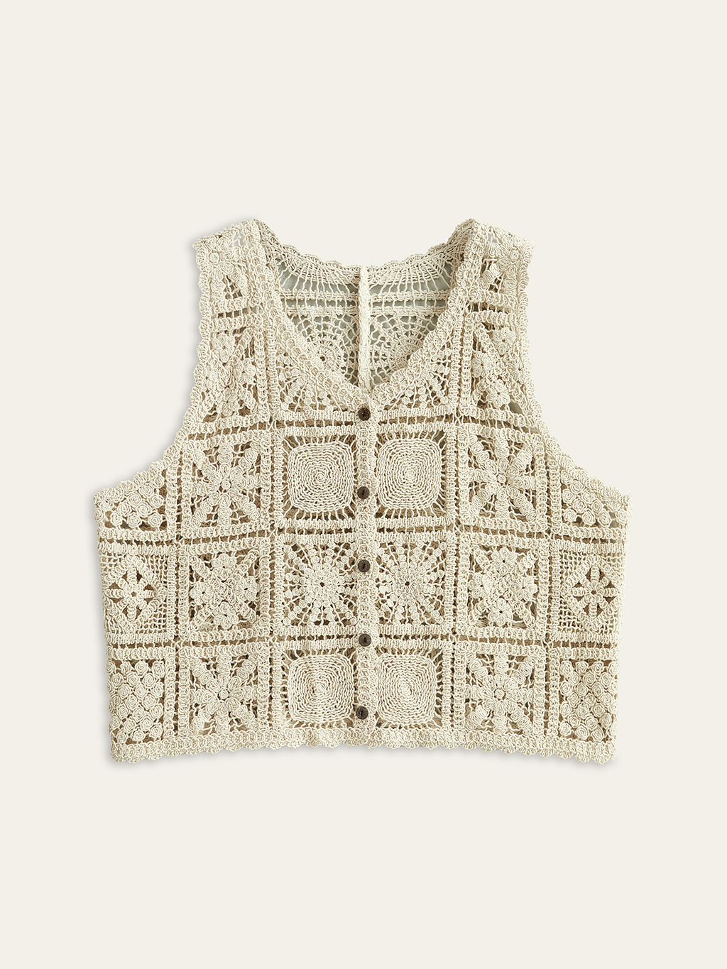 Gilet en maille crochetée boutonnée sur le devant