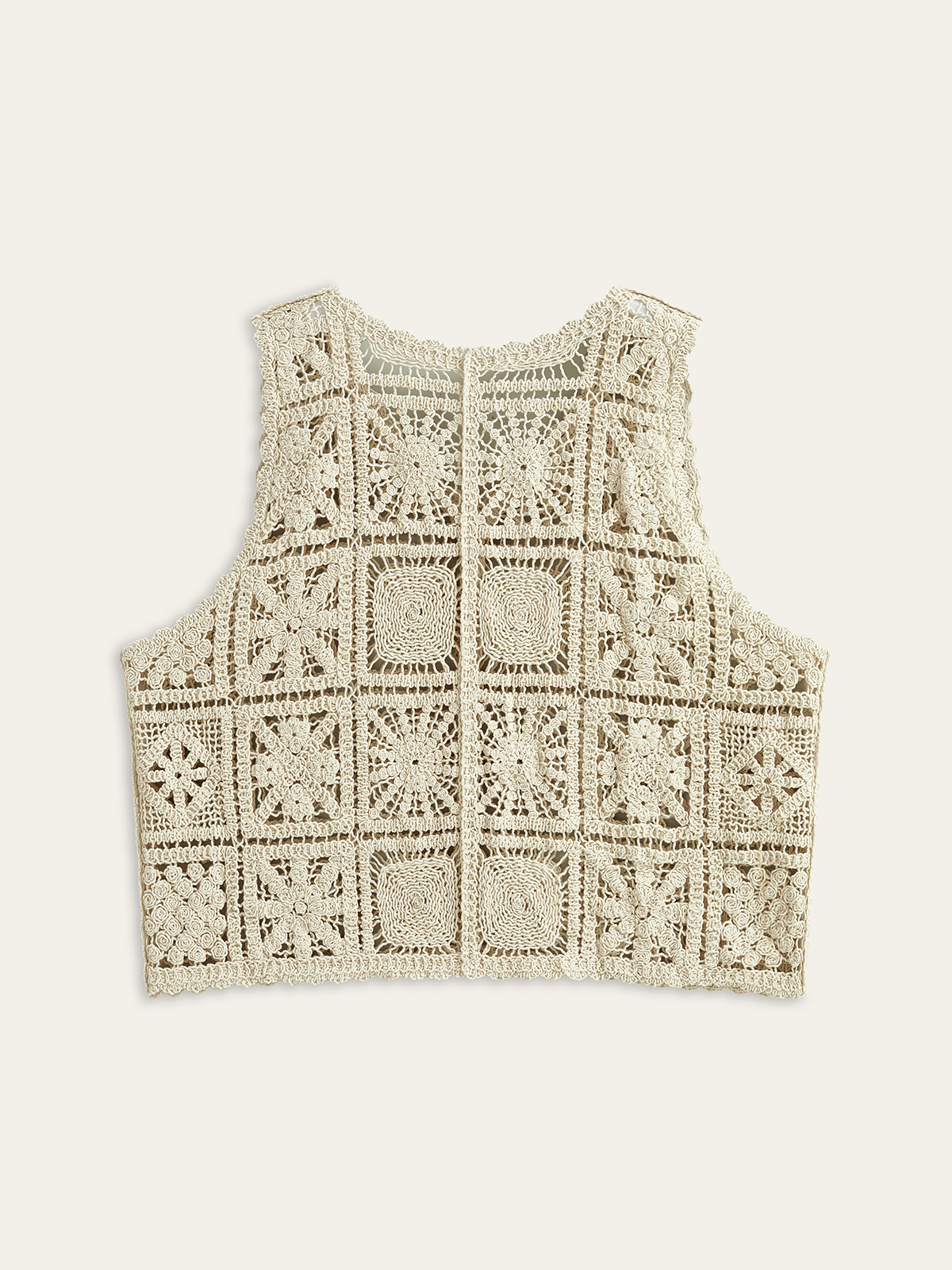 Gilet en maille crochetée boutonnée sur le devant
