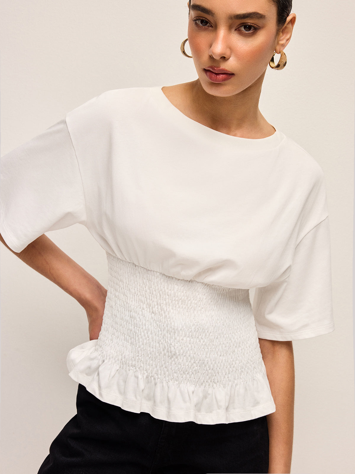 Haut en coton à taille smockée et ourlet à volants 