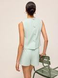 Ensemble short et top sans manches boutonnés au dos minimaliste