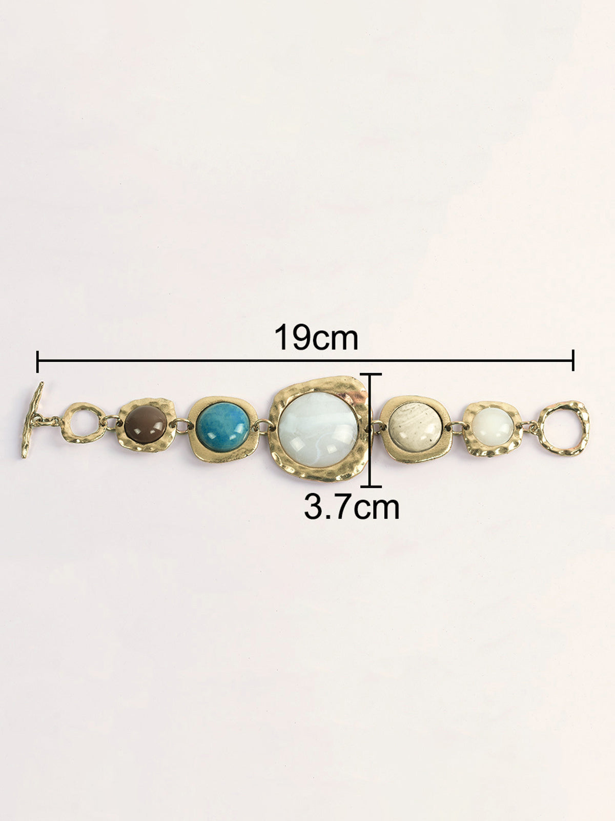 Bracelet multibranches doré orné de pierres