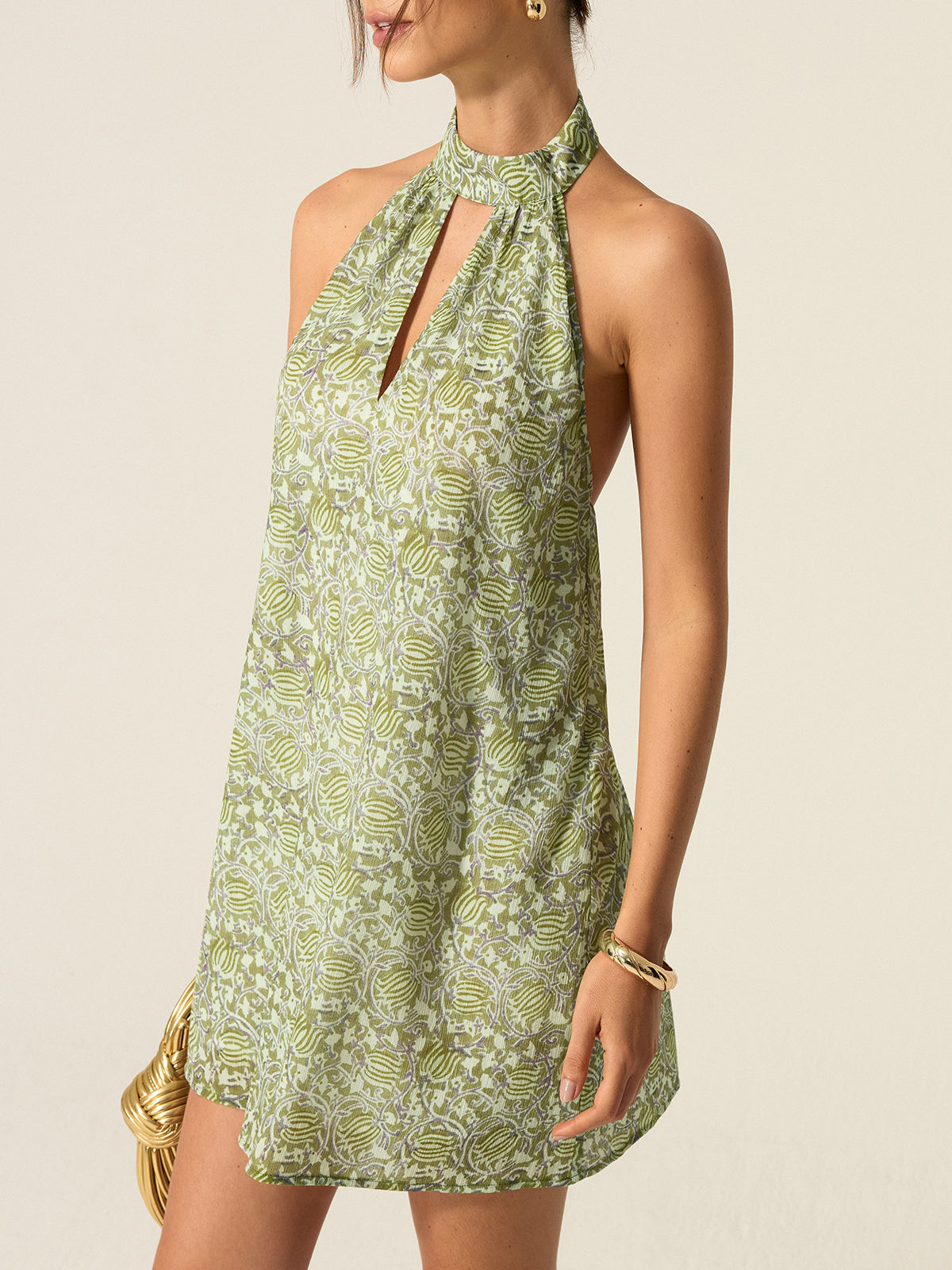 Robe mini imprimée à col halter et découpes 