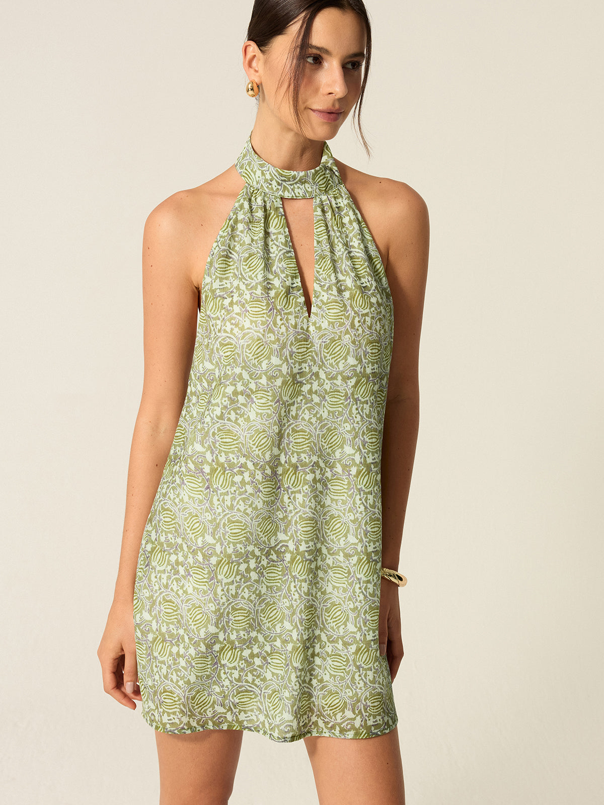 Robe mini imprimée à col halter et découpes 