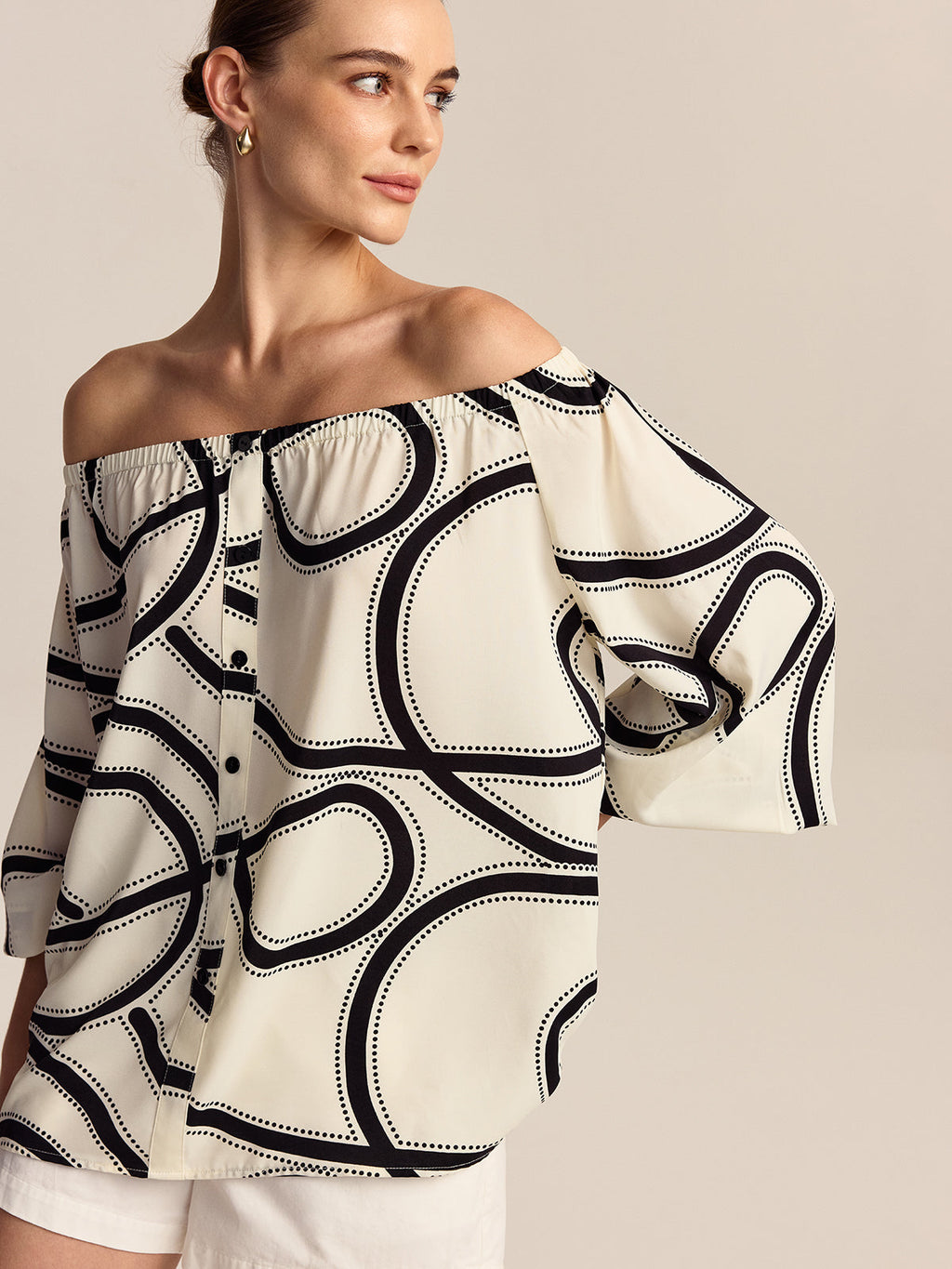 Chemisier à motifs décolleté aux épaules