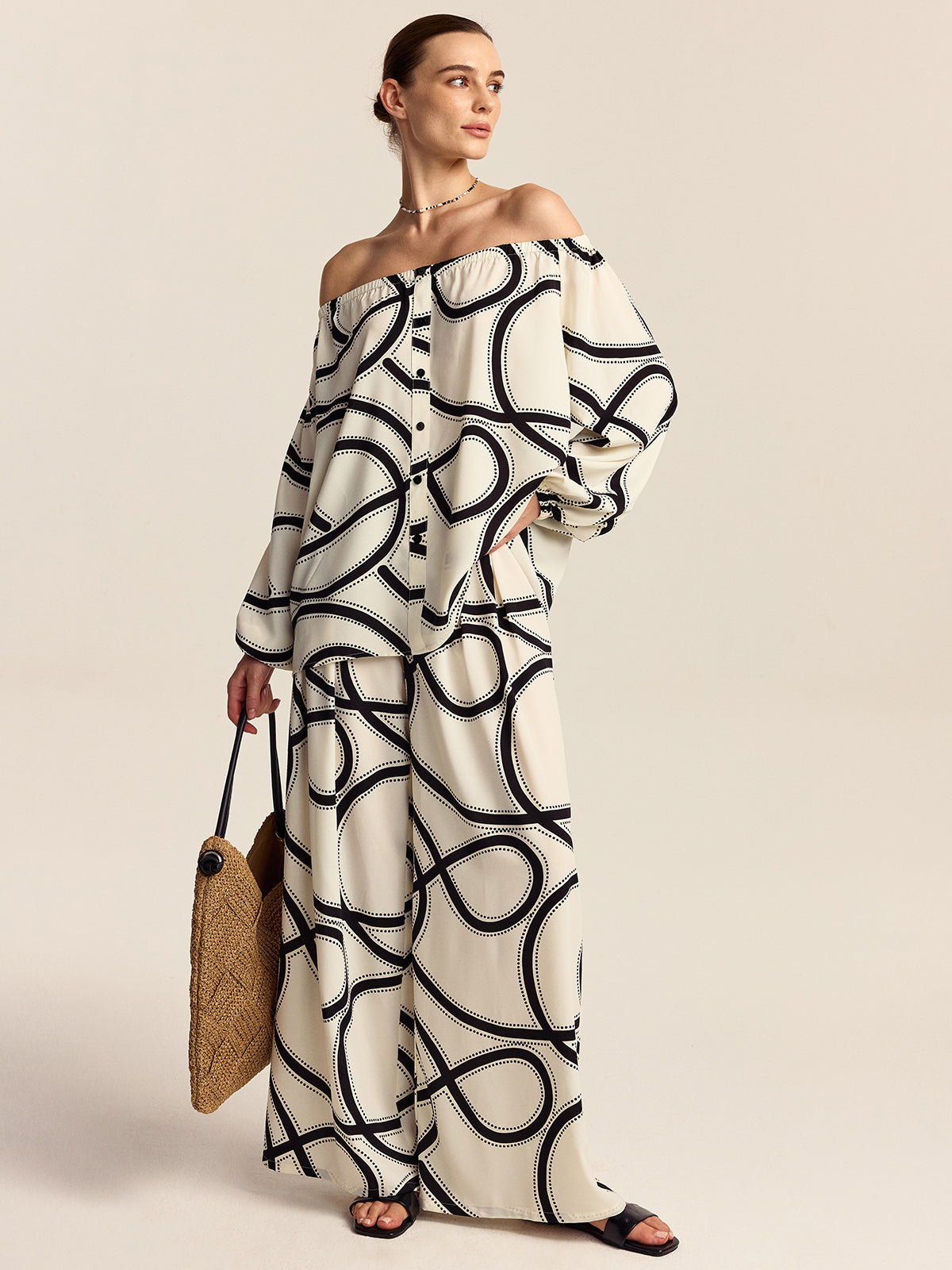 Pantalon à jambes larges semi-transparent à motifs 