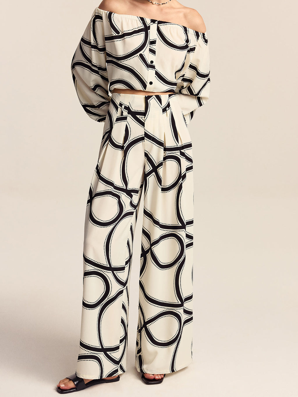 Pantalon ample semi-transparent à motifs