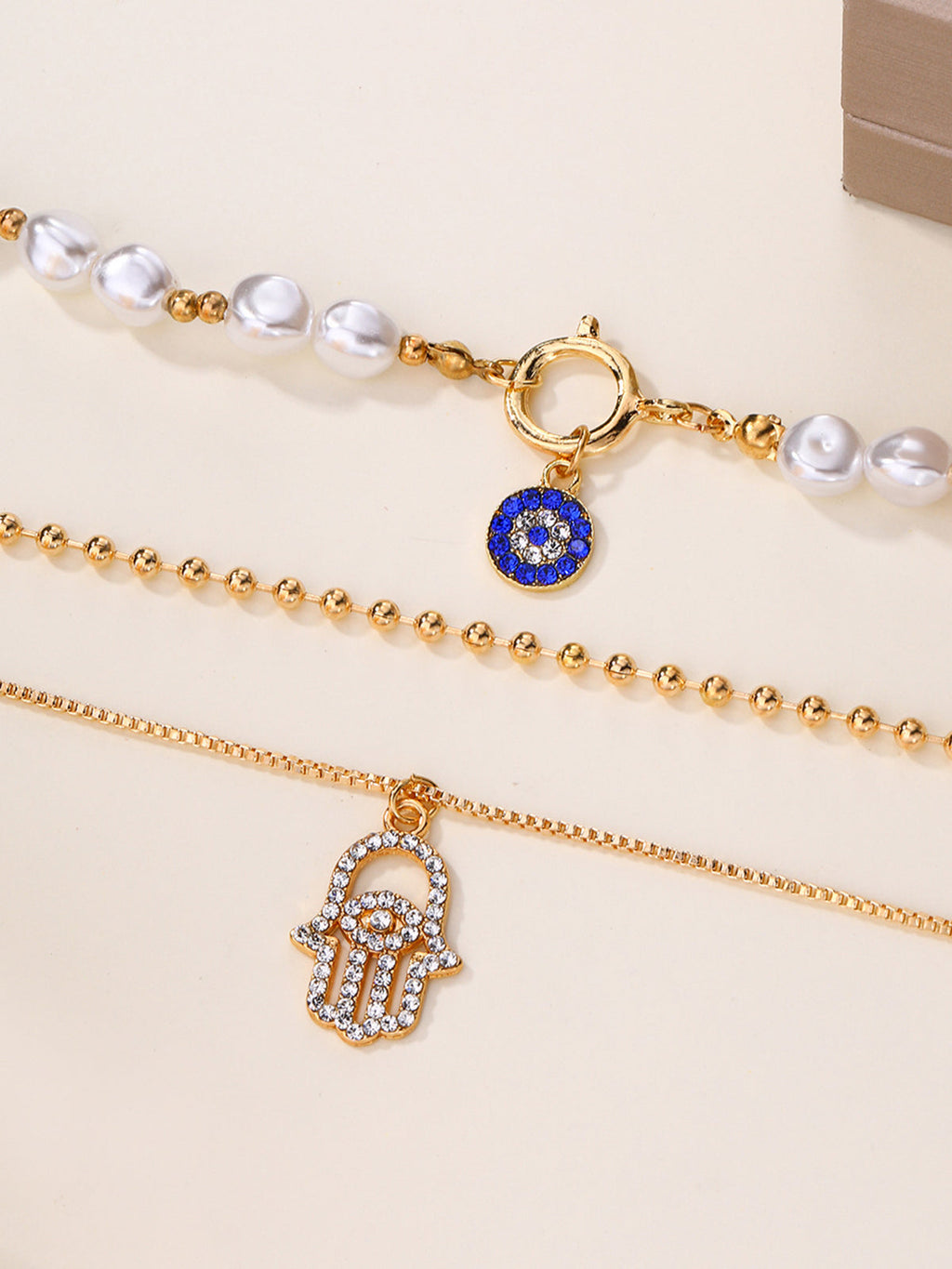 Ensemble de colliers superposés Perle et Main de Fatma