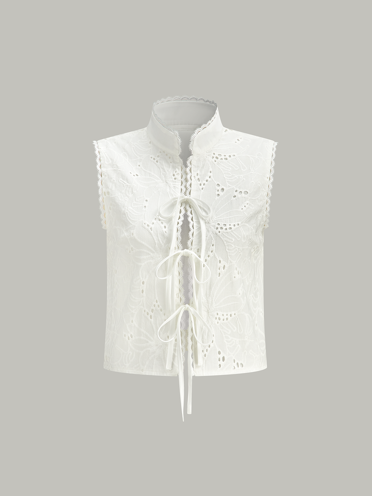 Haut court sans manches à œillets et lacets 