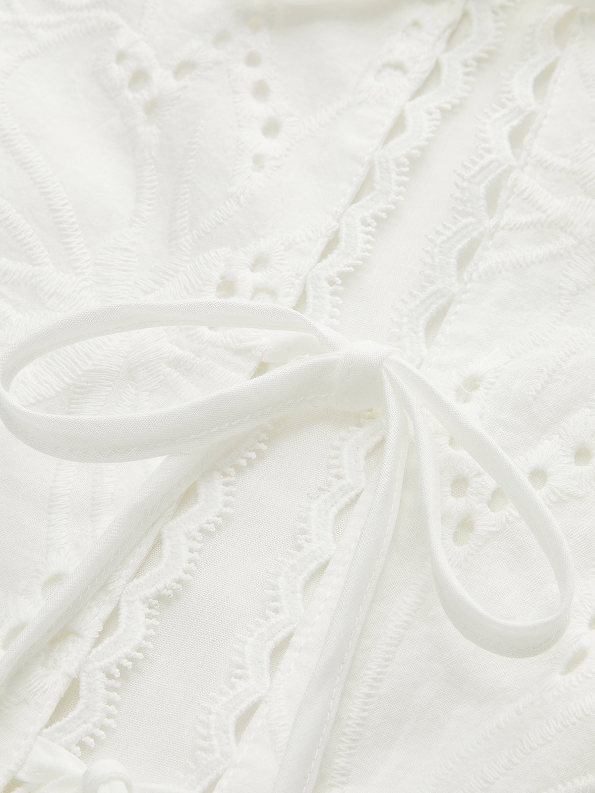 Haut court sans manches à œillets et lacets 