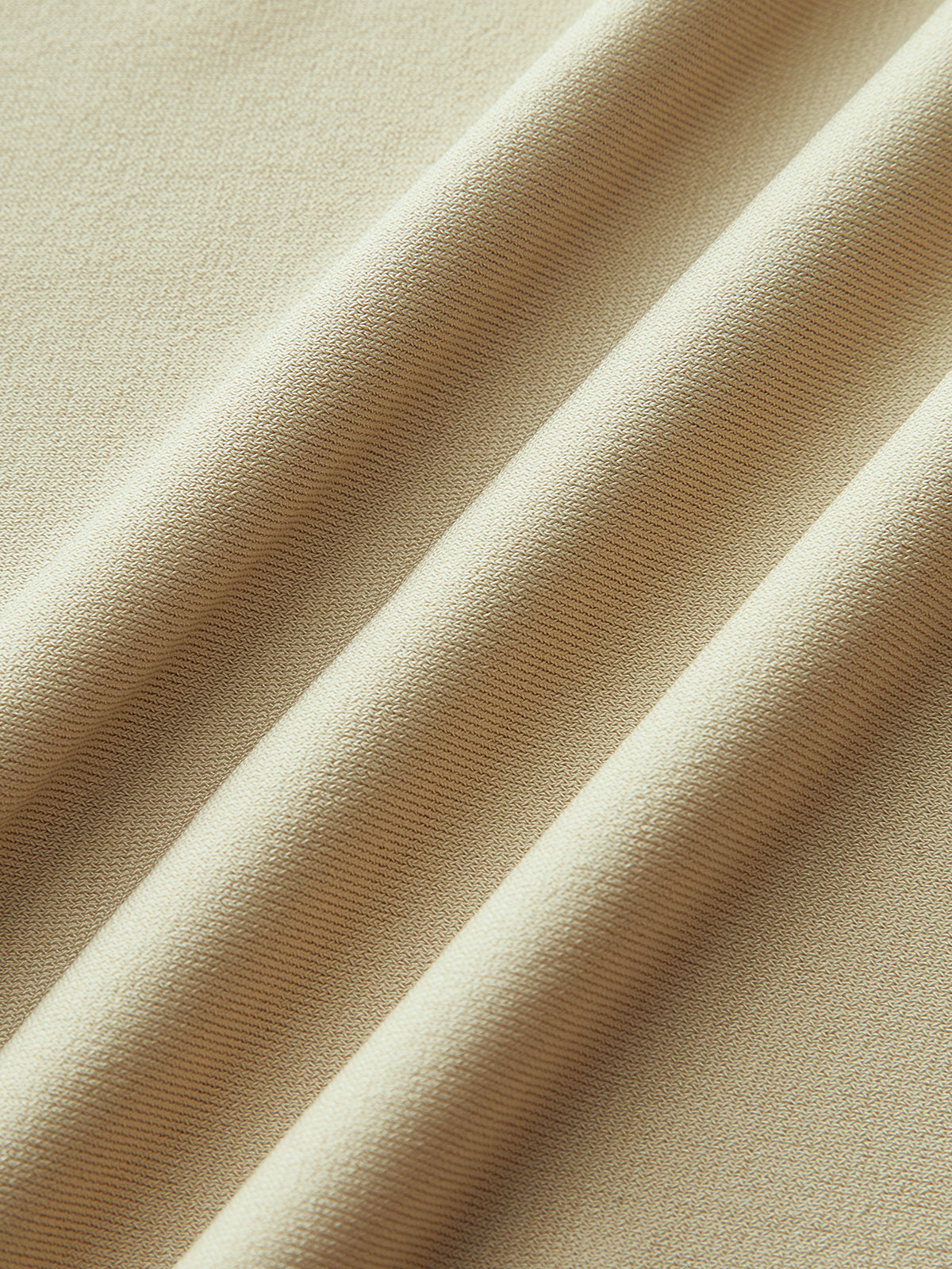 Haut asymétrique à col halter froncé 