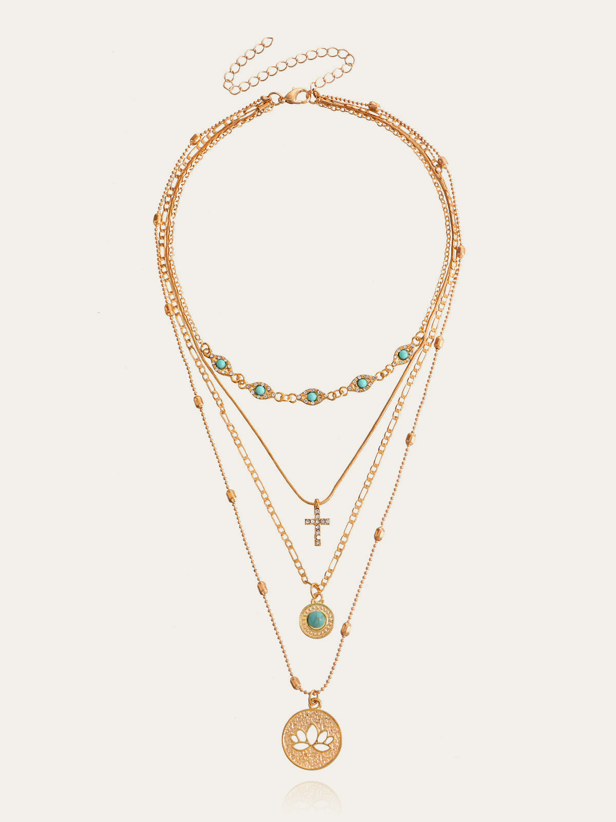 Collier à plusieurs rangs doré avec turquoise et breloques 