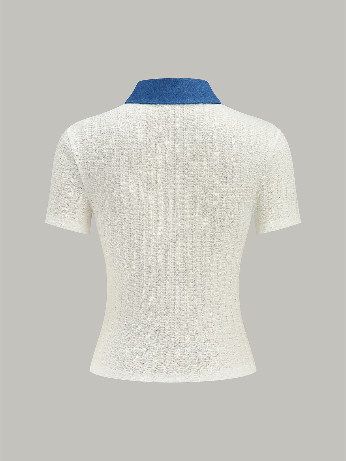 Polo en maille à col en jean avec bouton métallique