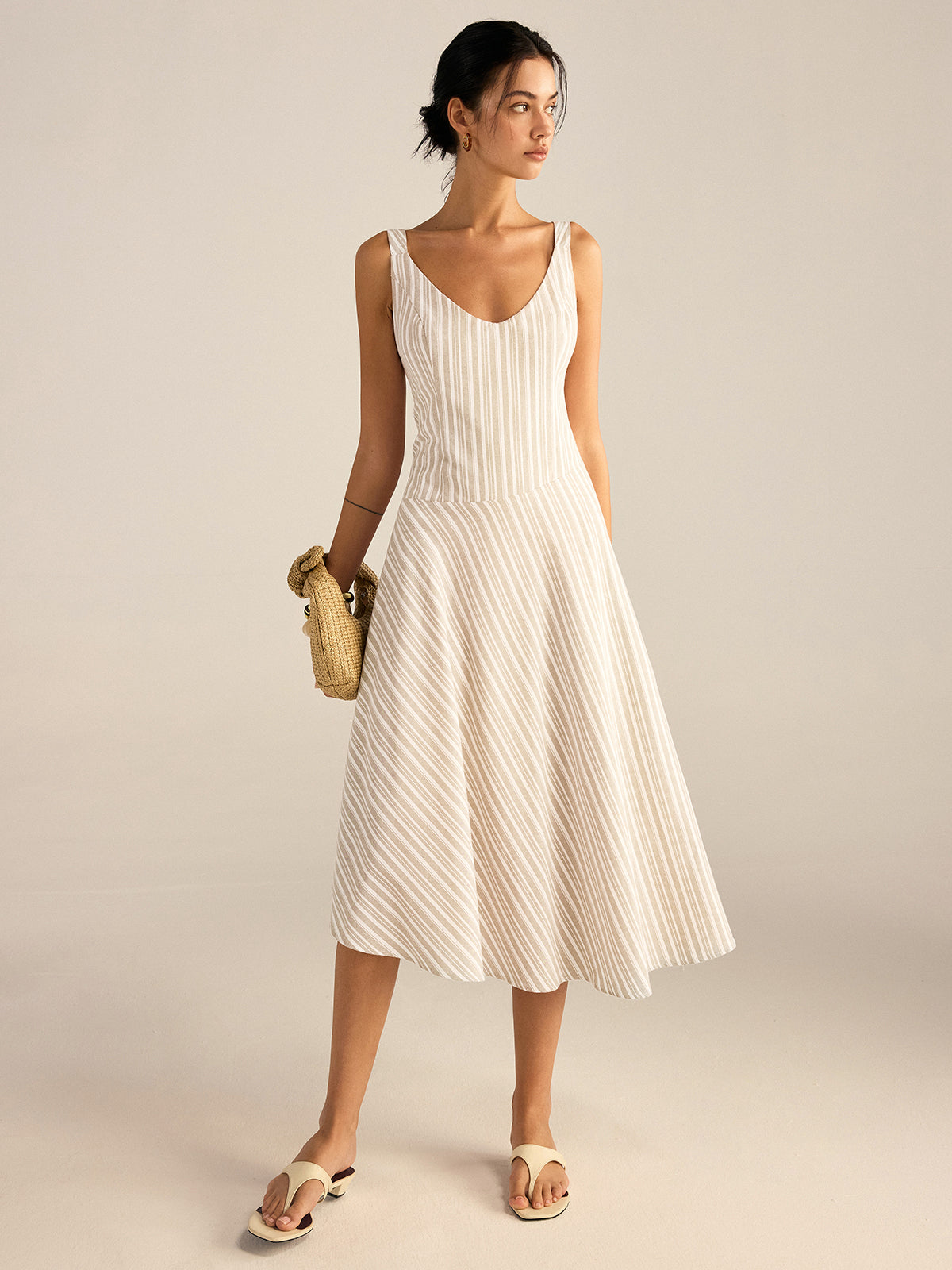 Robe midi rayée à ourlet asymétrique 