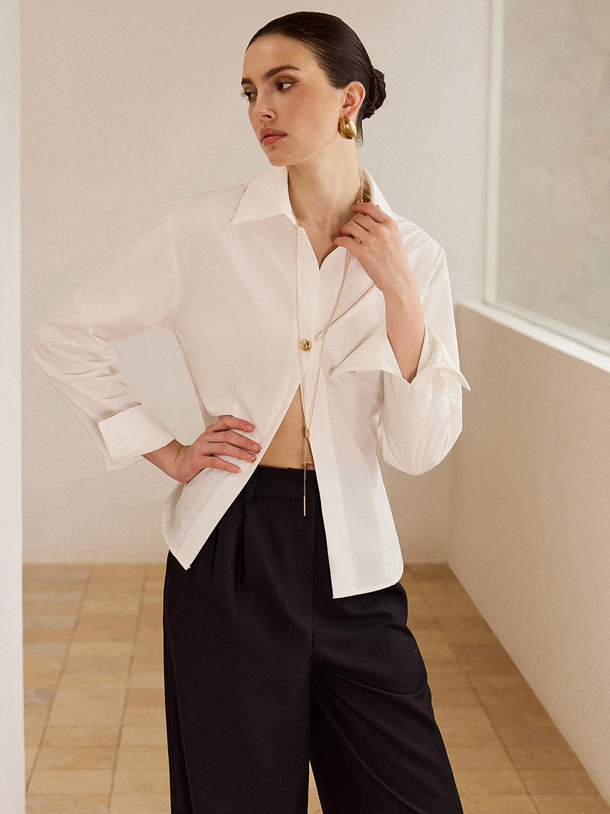 Chemise à manches longues avec boutons métalliques 