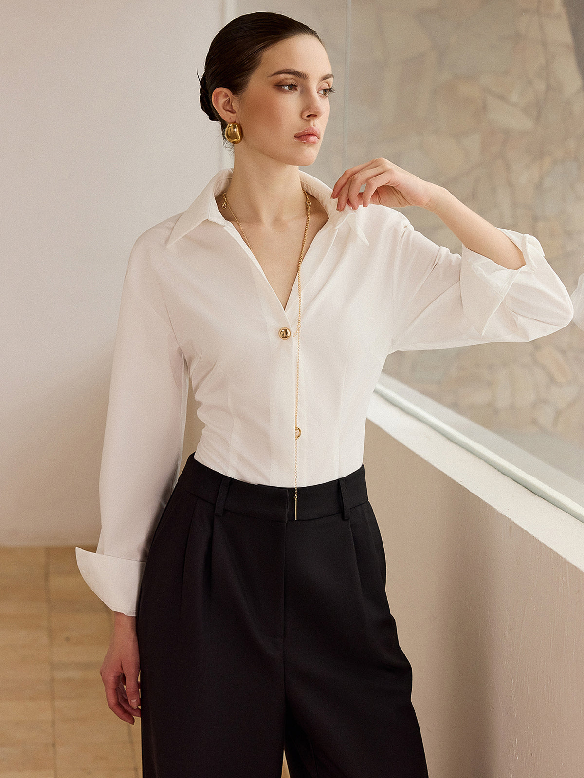 Chemise à manches longues avec boutons métalliques 