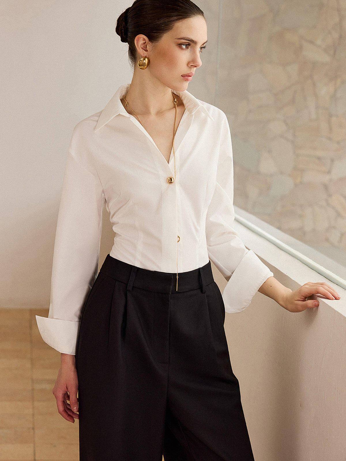 Chemise à manches longues avec boutons métalliques 