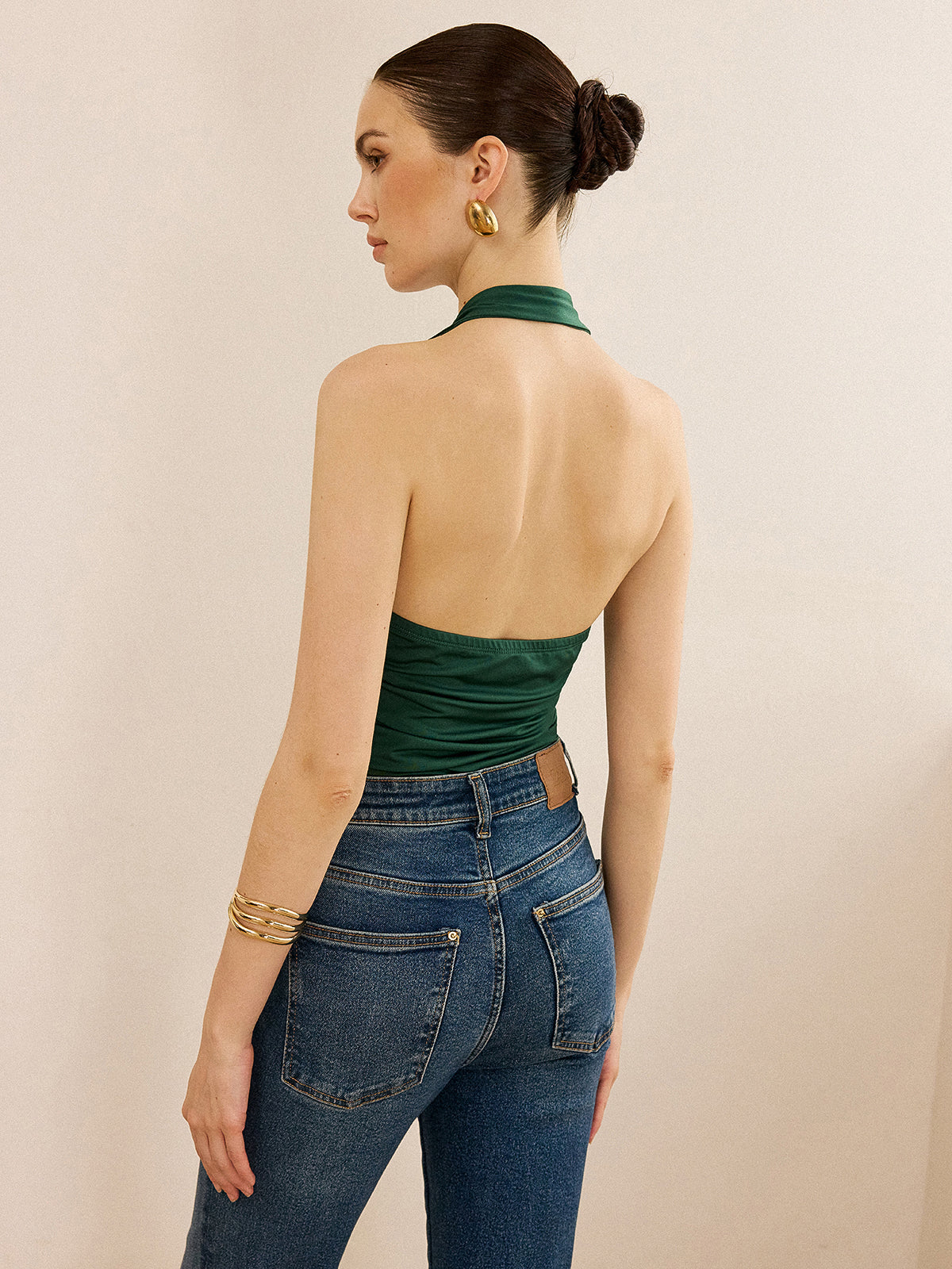 Neckholder-Top mit Metalldetails und offenem Rücken 