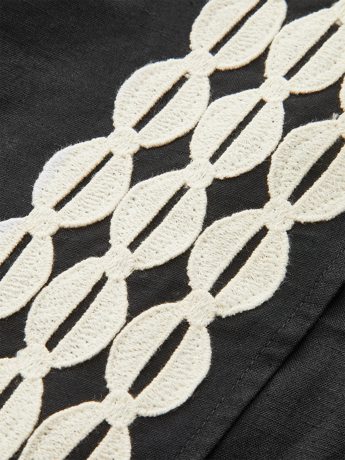 Minirock mit farblich abgesetztem Webbesatz und Wickeloptik 