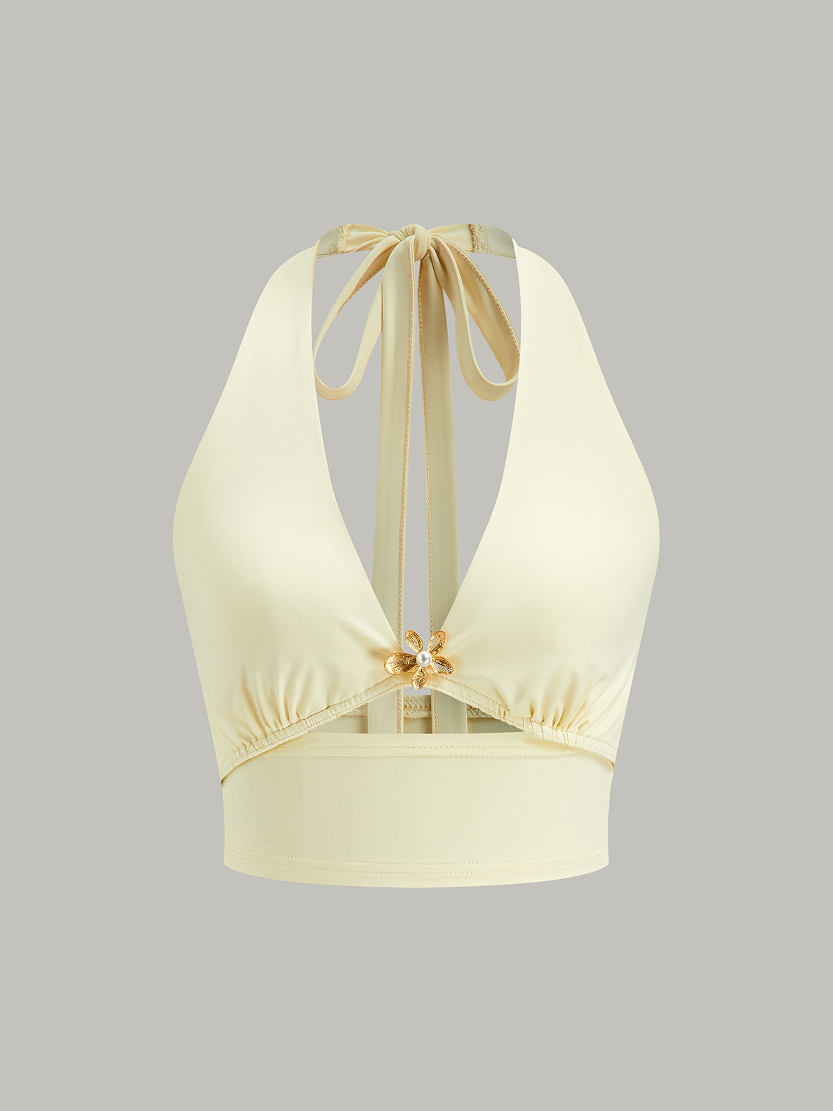 Ensemble haut court dos nu et jupe à empiècements en résille 