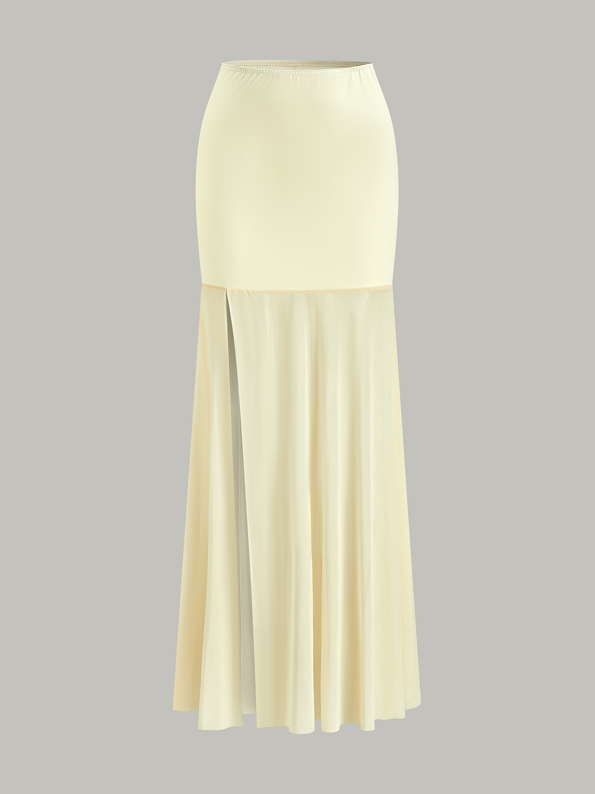 Ensemble haut court dos nu et jupe à empiècements en résille 