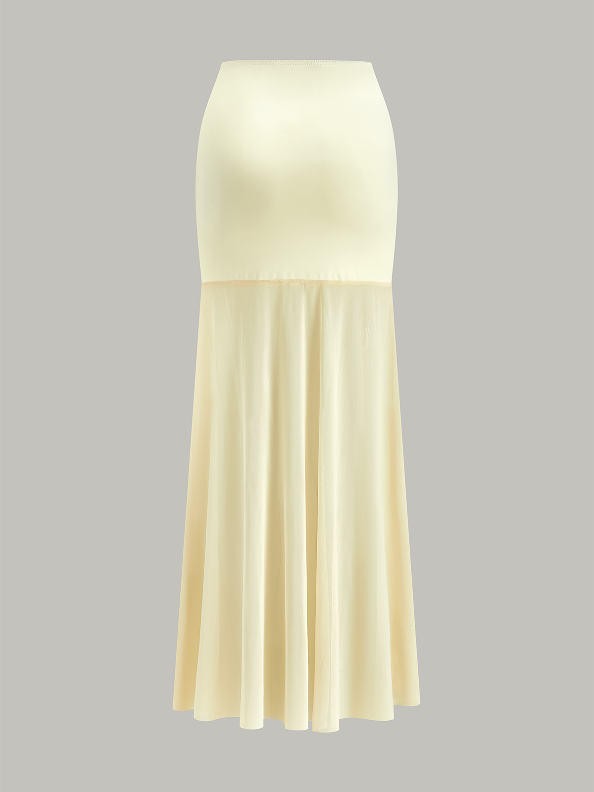 Ensemble haut court dos nu et jupe à empiècements en résille 