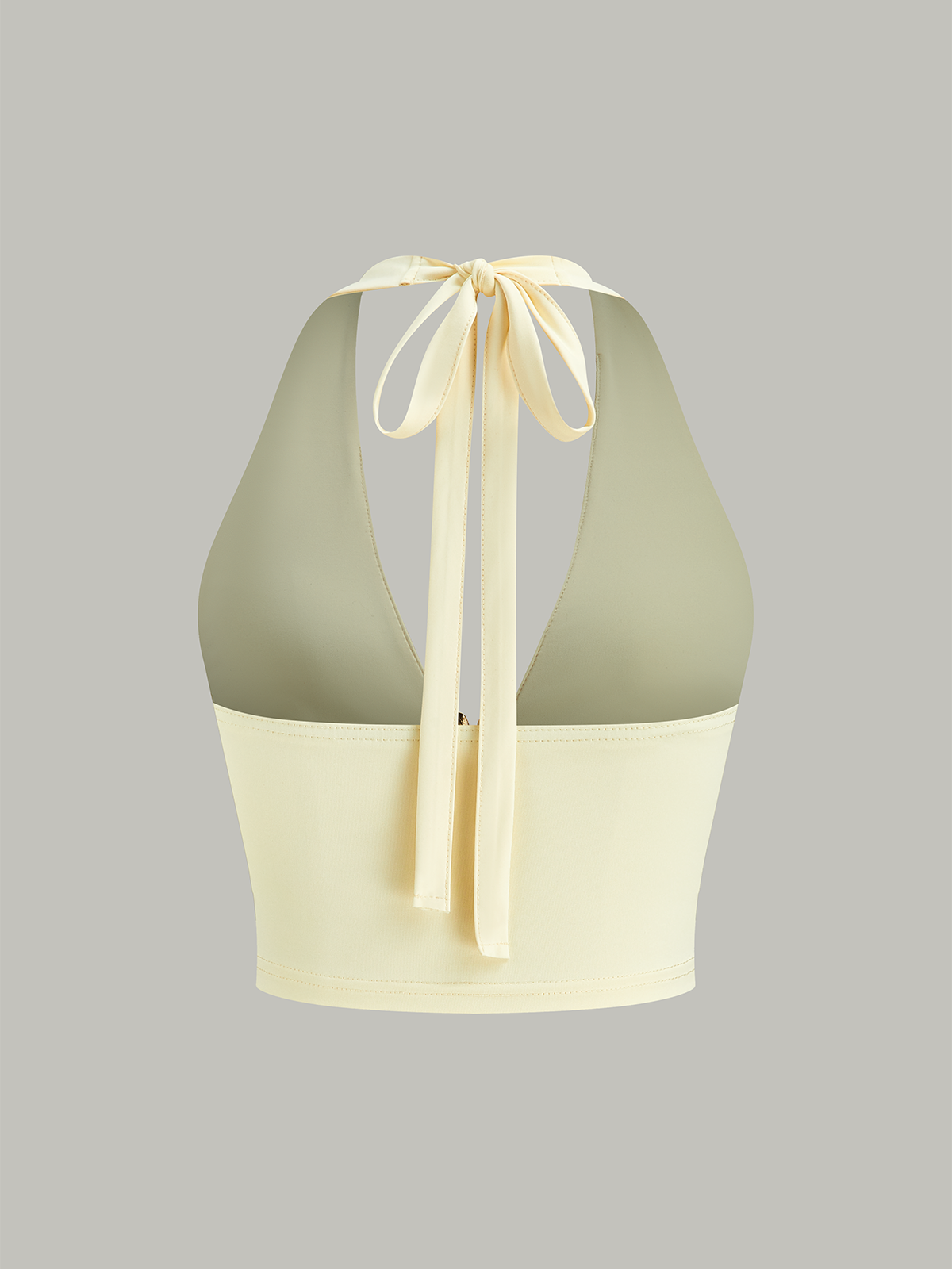 Ensemble haut court dos nu et jupe à empiècements en résille 