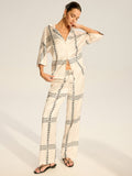 Ensemble de pantalon et haut en satin imprimé géométrique