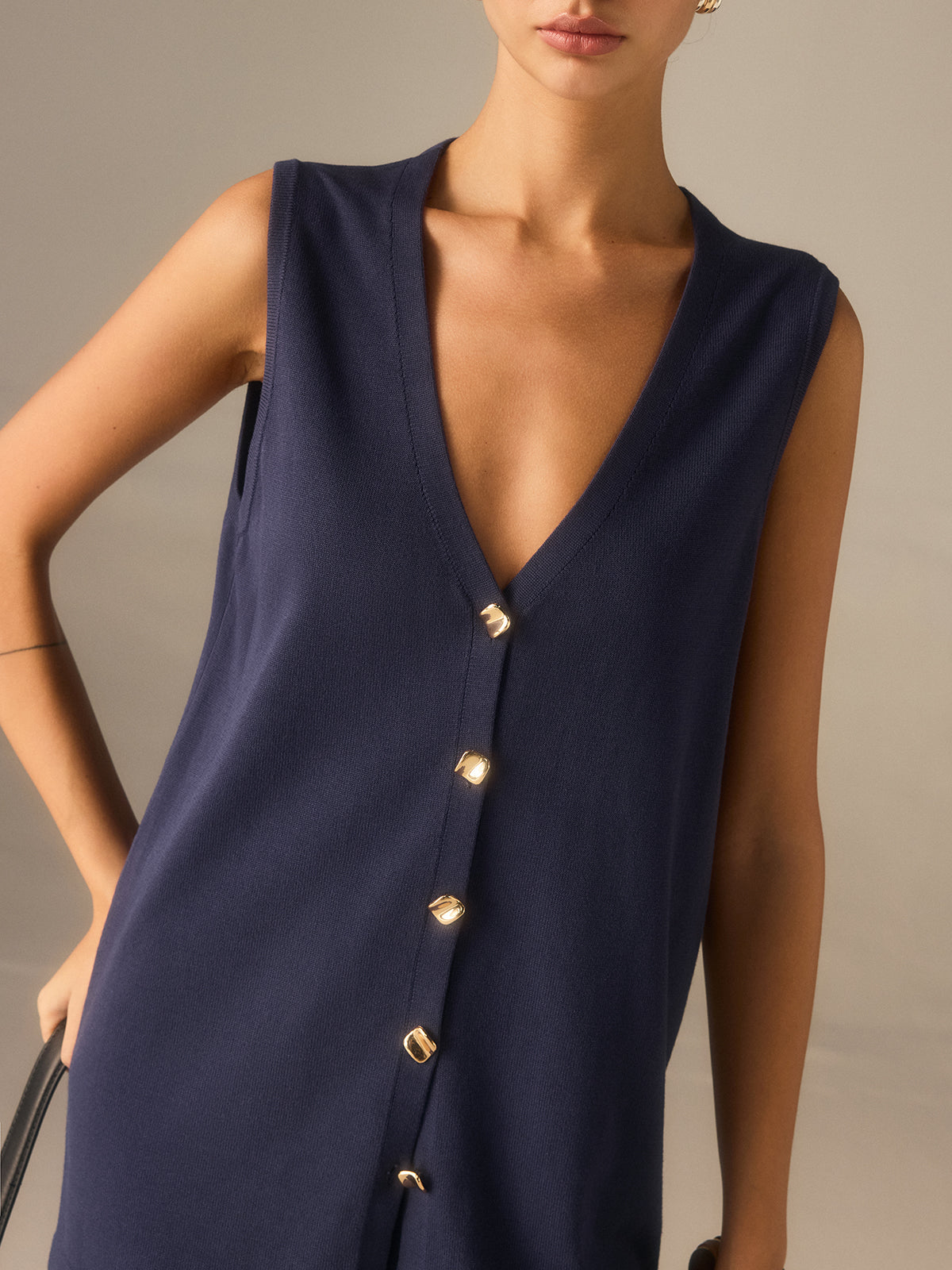 Ensemble gilet et pantalon en maille à boutons dorés 