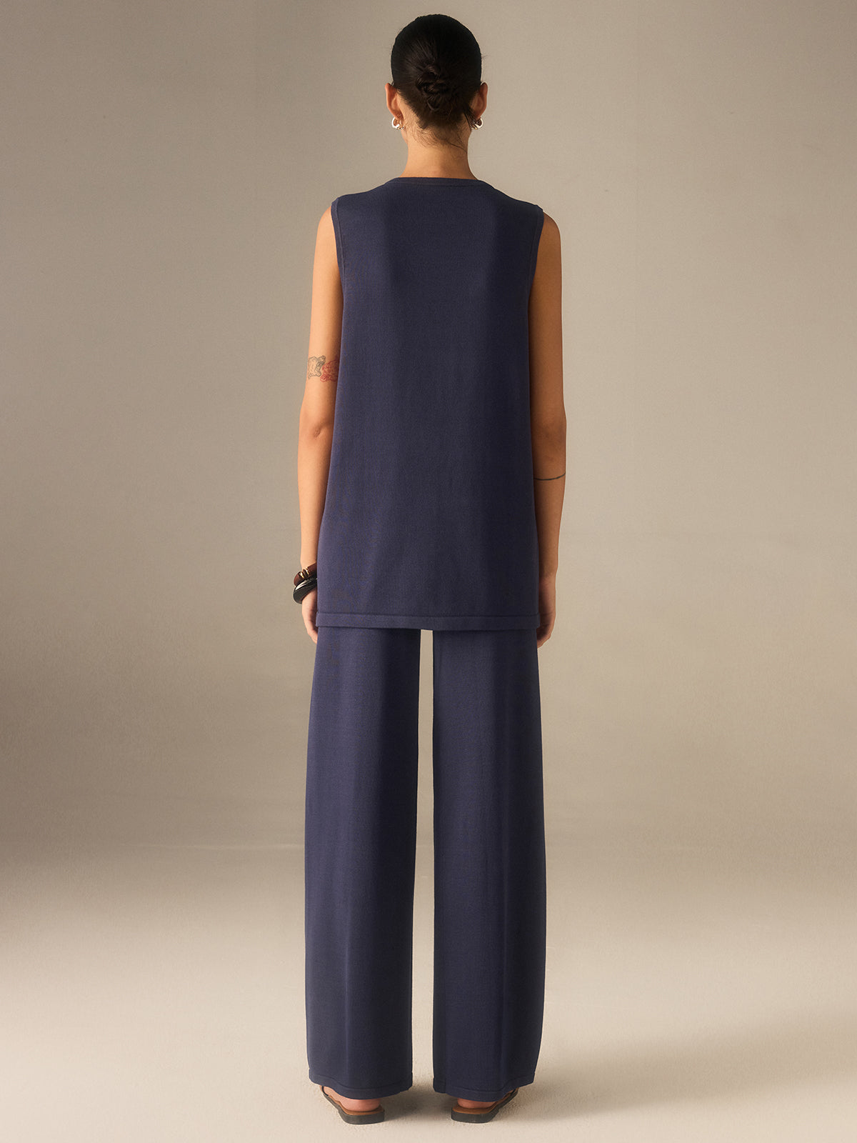 Ensemble gilet et pantalon en maille à boutons dorés 