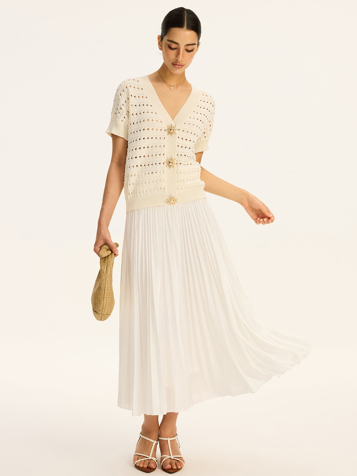 Cardigan à col en V en maille ajourée et boutons métalliques 