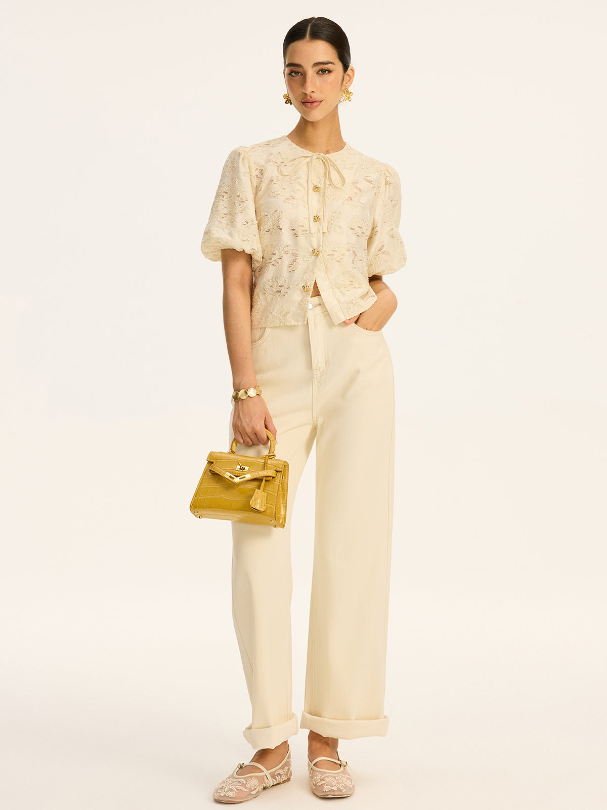 Haut en mélange de coton semi-transparent à motif jacquard et boutons métalliques
