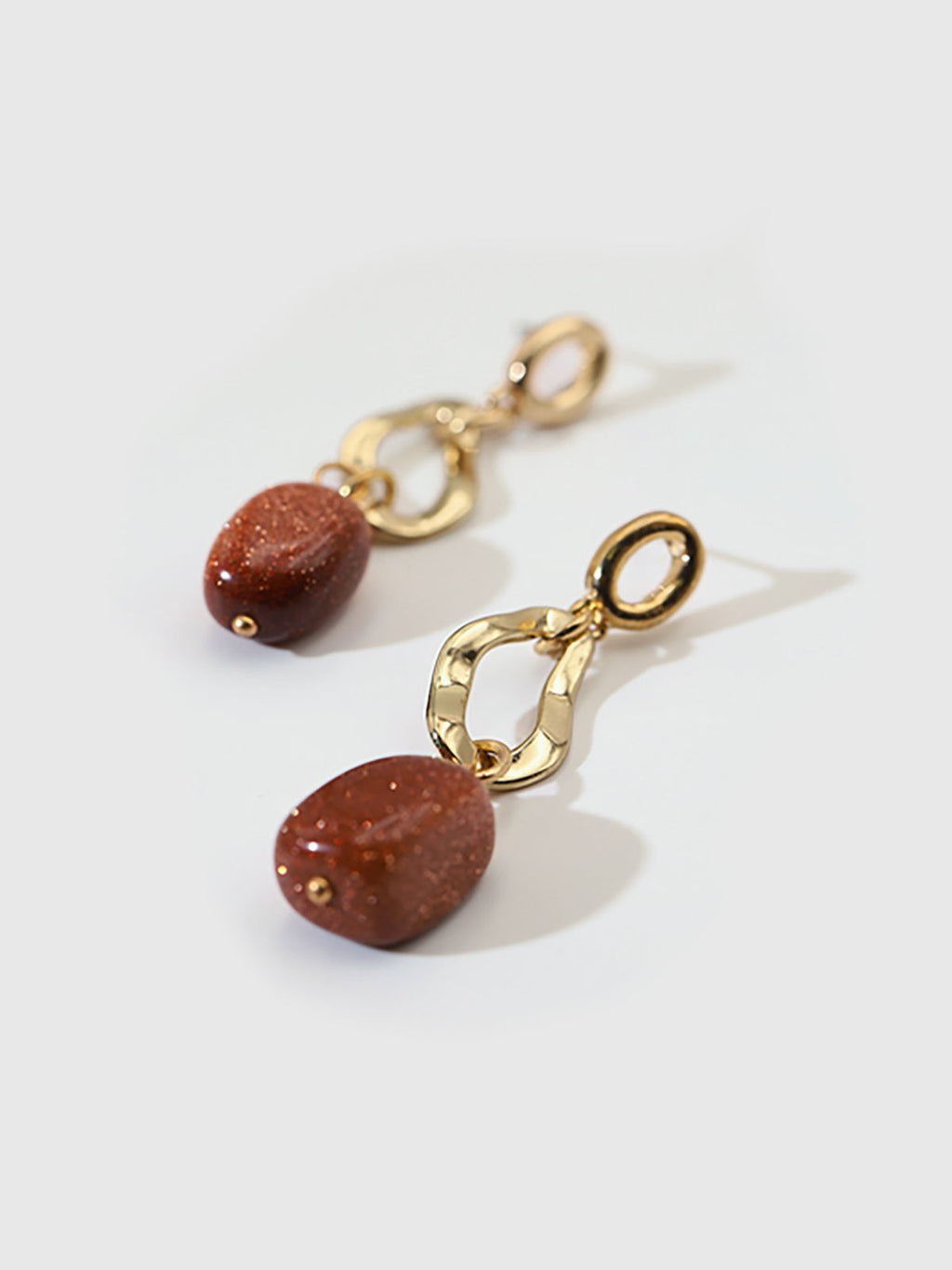 Boucles d'oreilles pendantes avec pierre