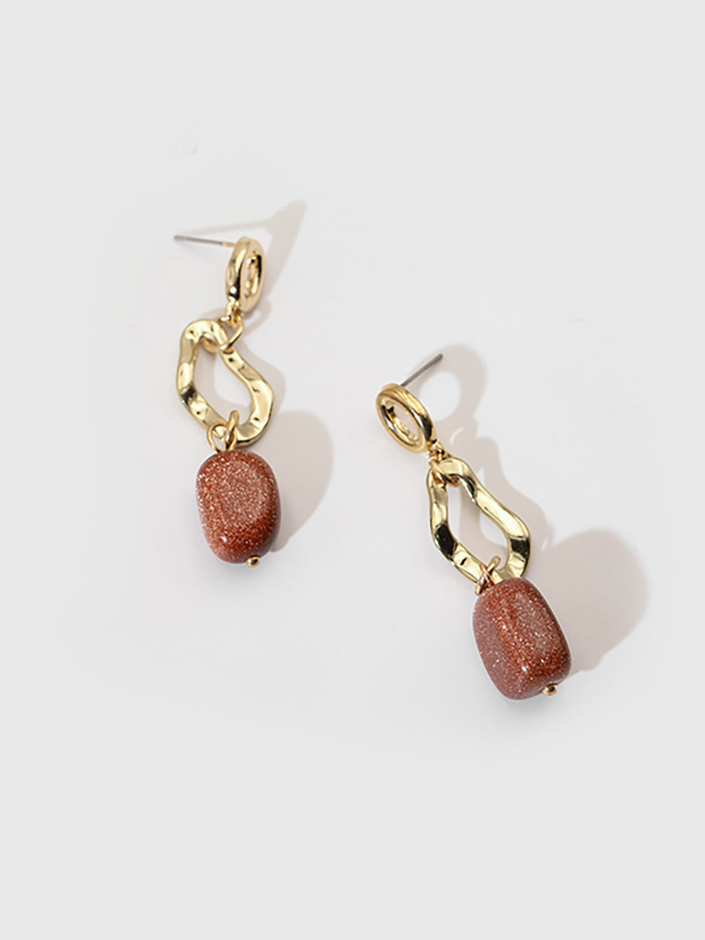 Boucles d'oreilles pendantes avec pierre