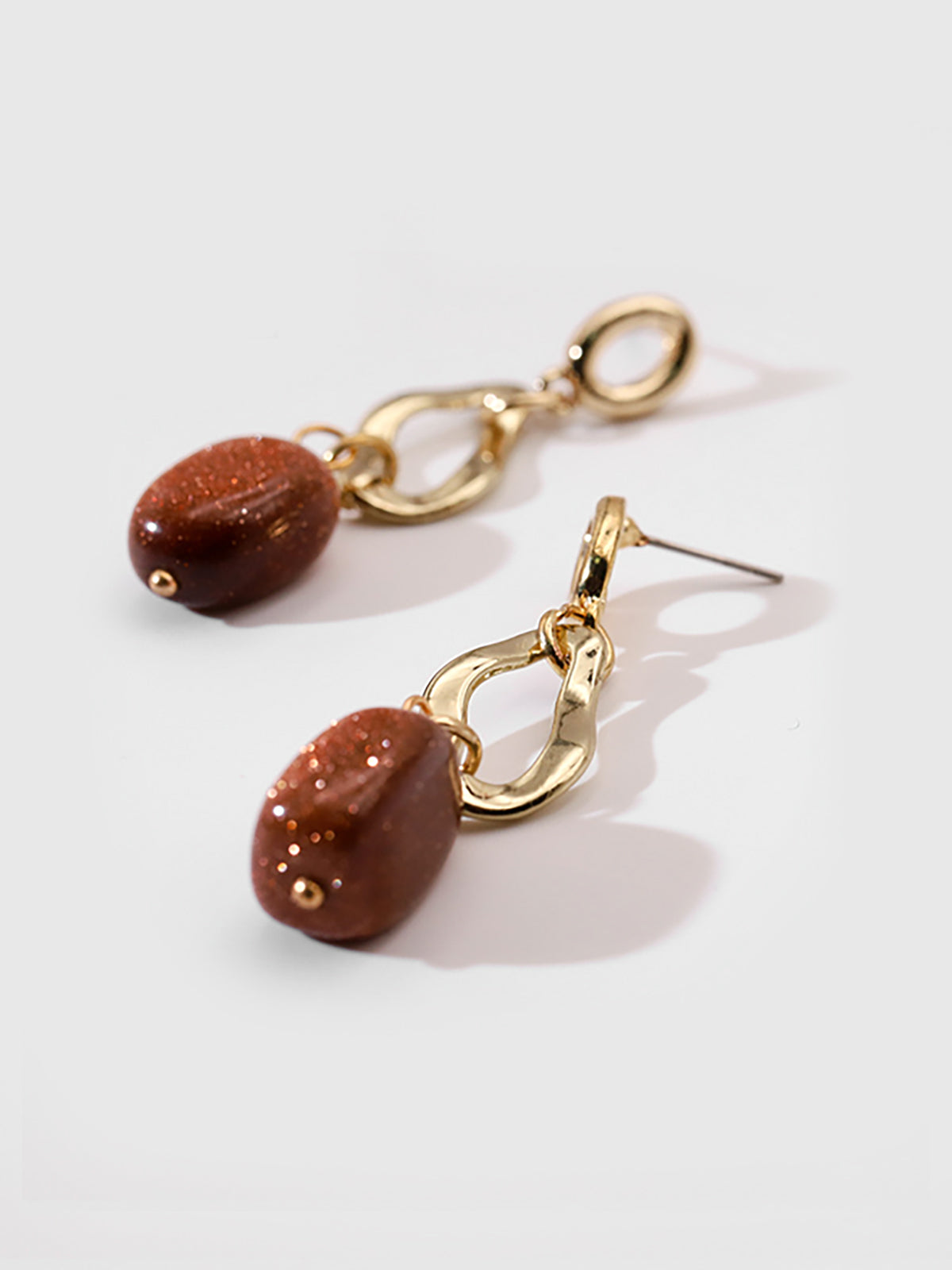 Boucles d'oreilles pendantes avec pierre