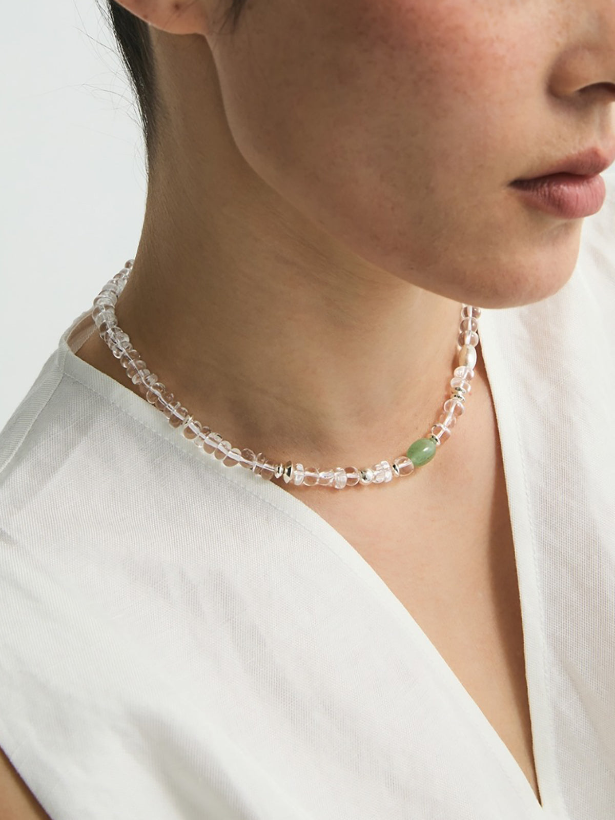 Clear Crystal Beaded Necklace with Green Gemstone Accent