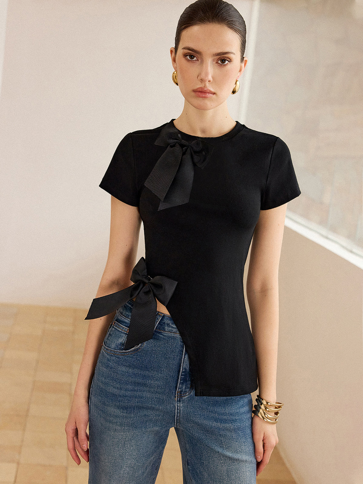 3D Bow-Detailed Top with Asymmetric Hem