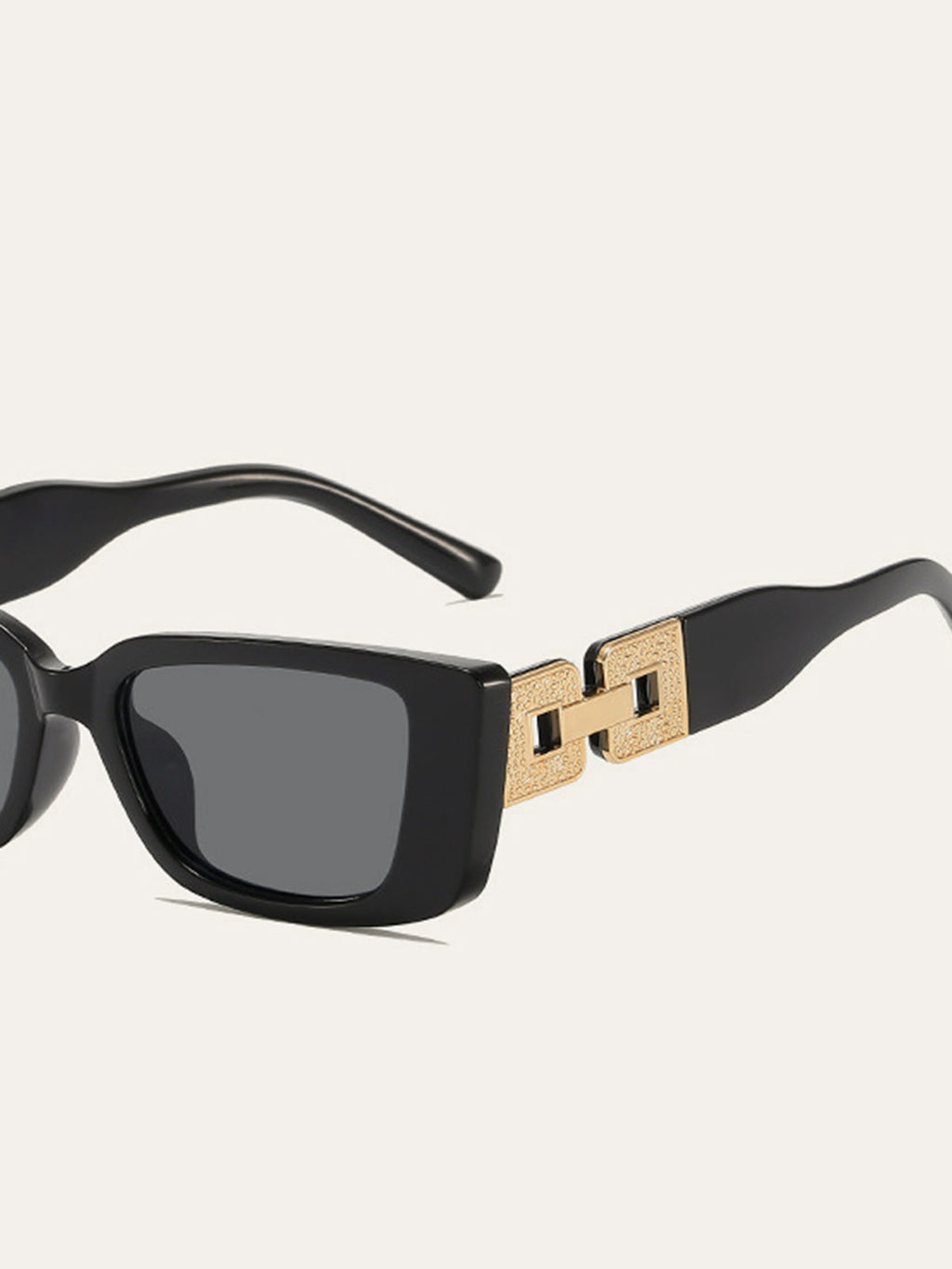Rechteckige Sonnenbrille mit dekorativen Goldgelenken