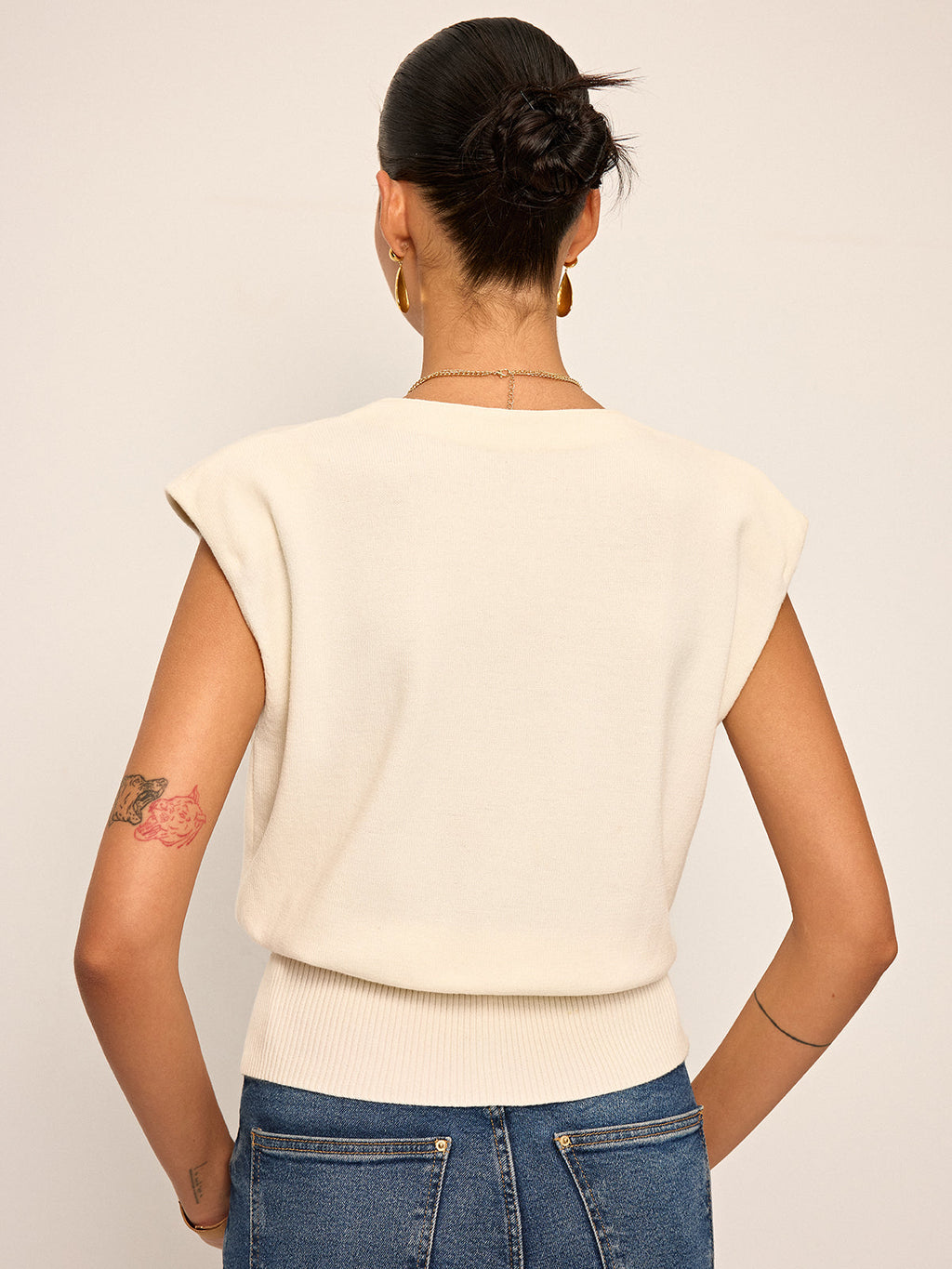 Gilet en maille asymétrique à porter des deux côtés