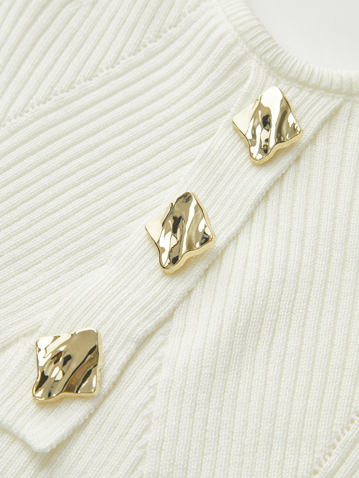 Débardeur en maille côtelée avec boutons métalliques