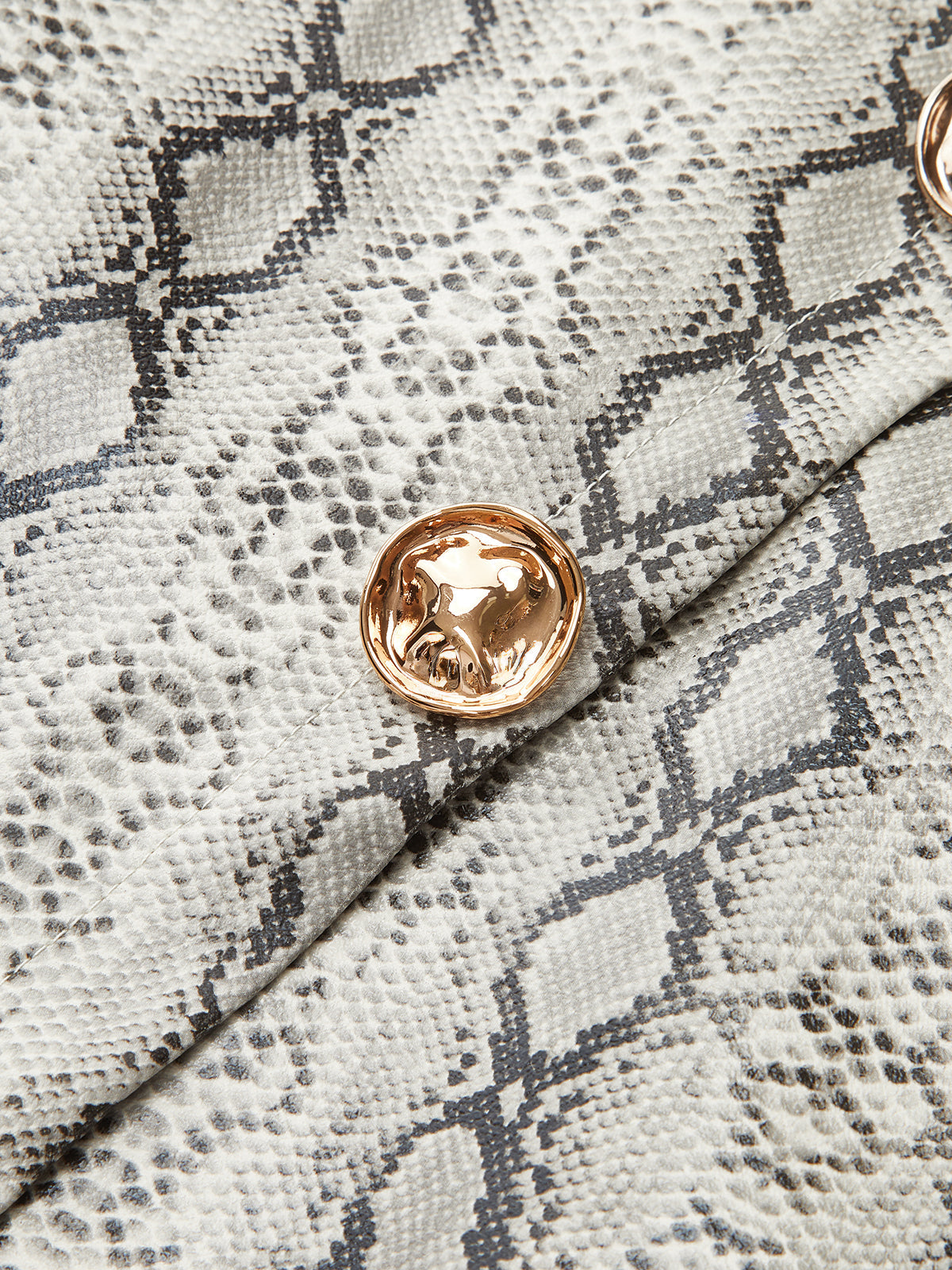 Asymmetrischer Minirock aus PU-Leder mit Schlangenmuster 