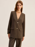 Blazer à col en V et boutons métalliques